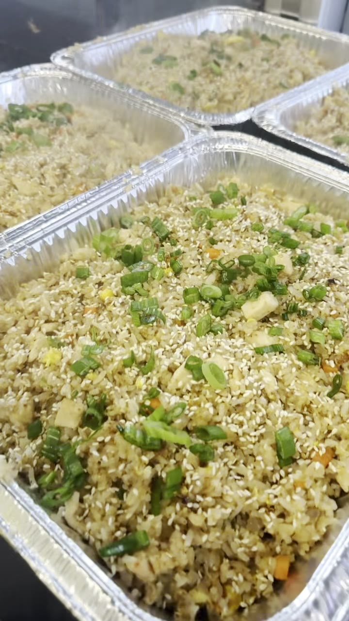Trays of chicken fried rice