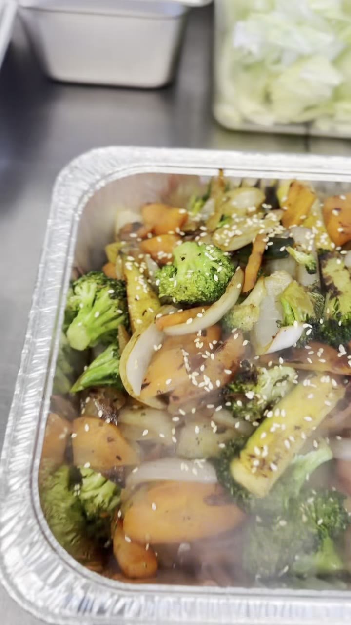 A tray of sautéed vegetables