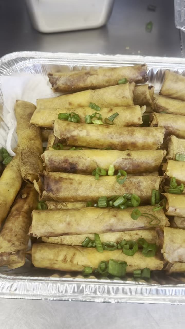 A tray of fried lumpia